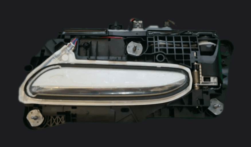 Smart access door-handle module — the mechanism, sensors, and wiring behind the handle